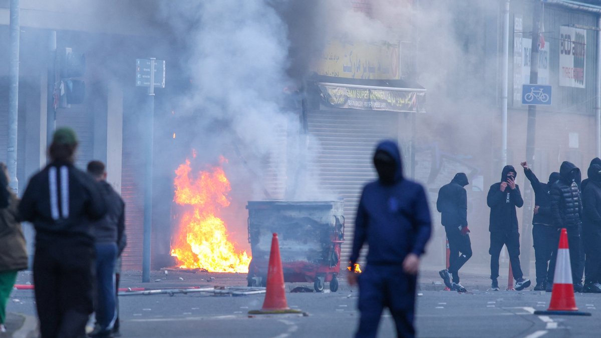 A building is set on fire in downtown Belfast
