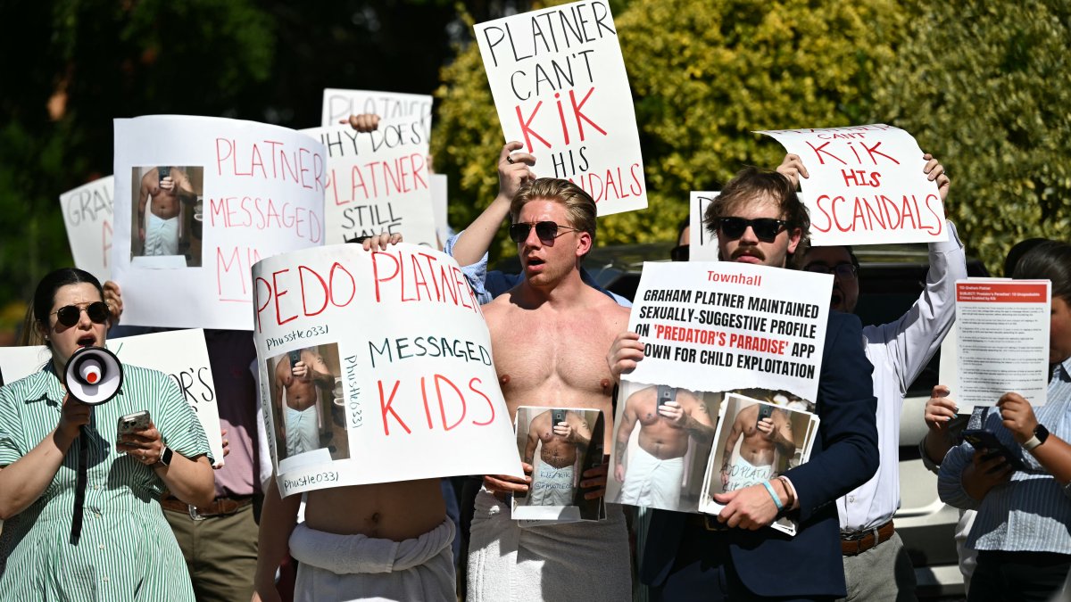 Several people protest against Graham Platner