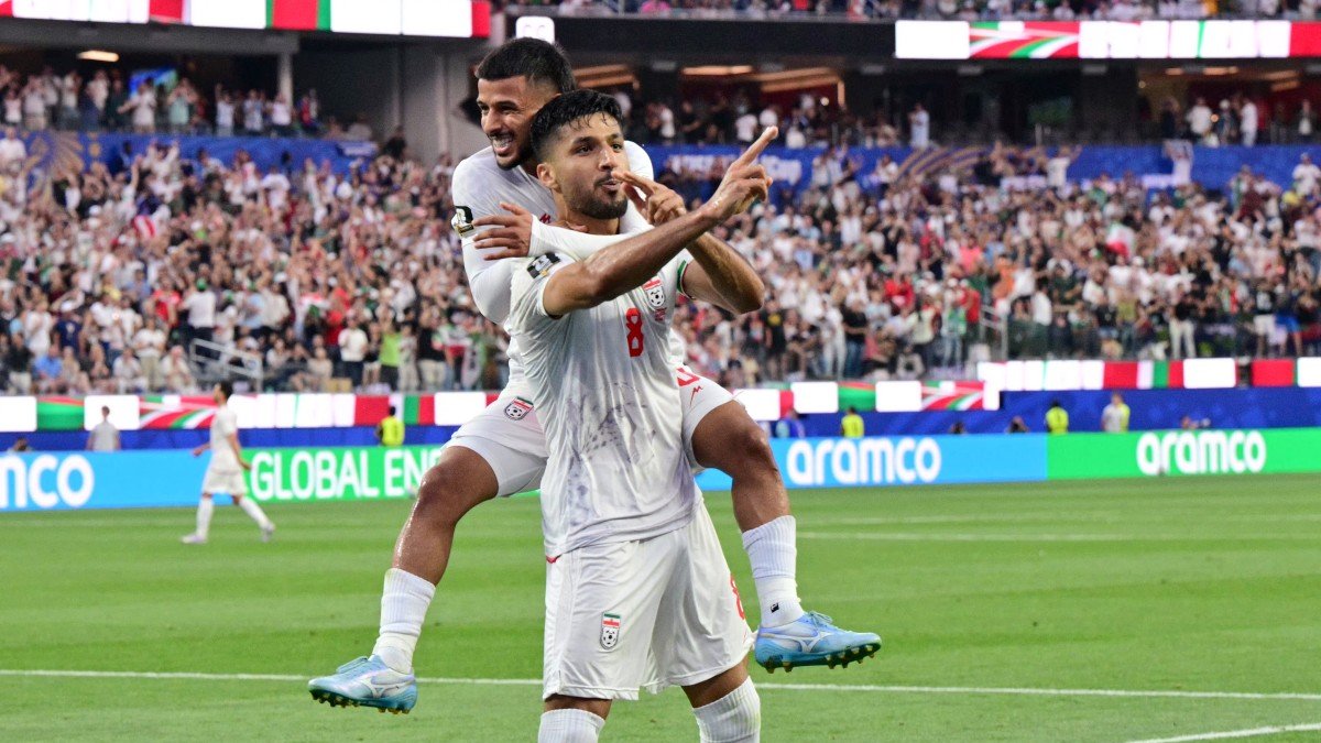 Iranian player Mohammad Mohebbi celebrates his goal against New Zealand