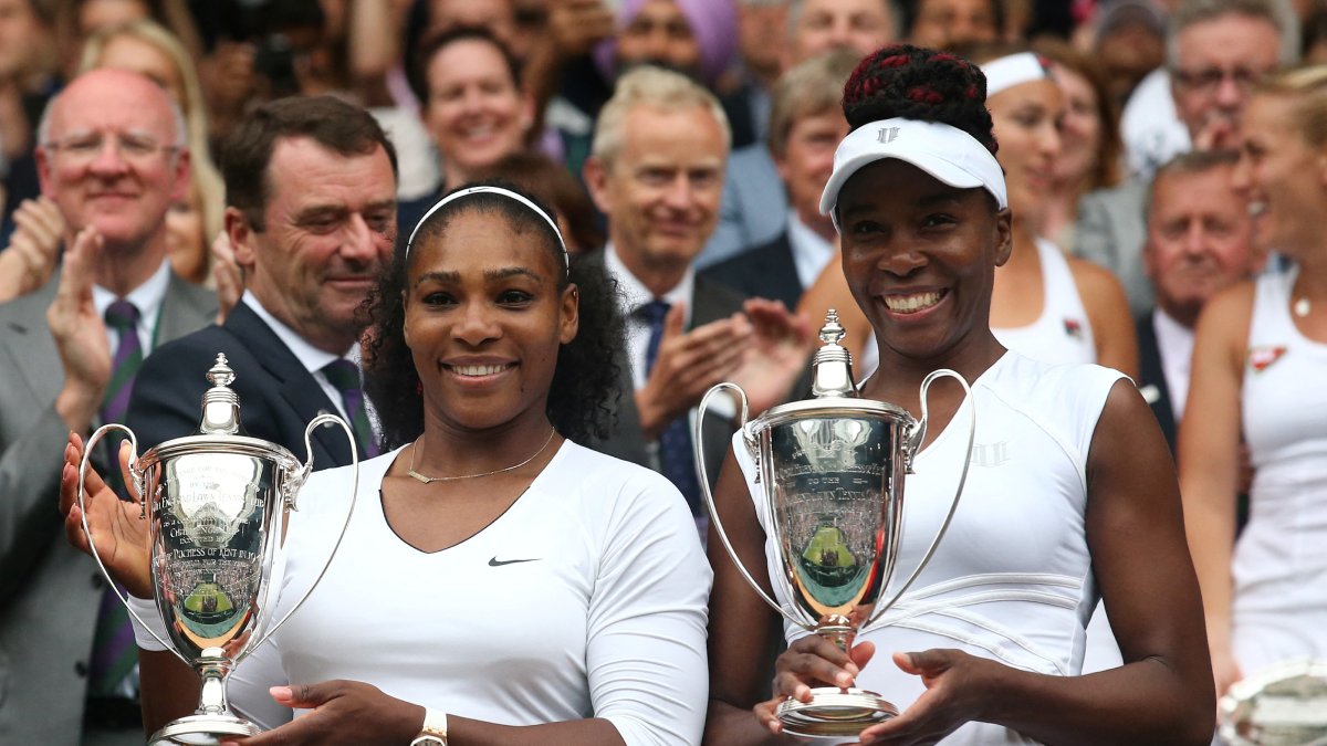 Serena and Venus Williams winning Wimbledon in 2016. File photo