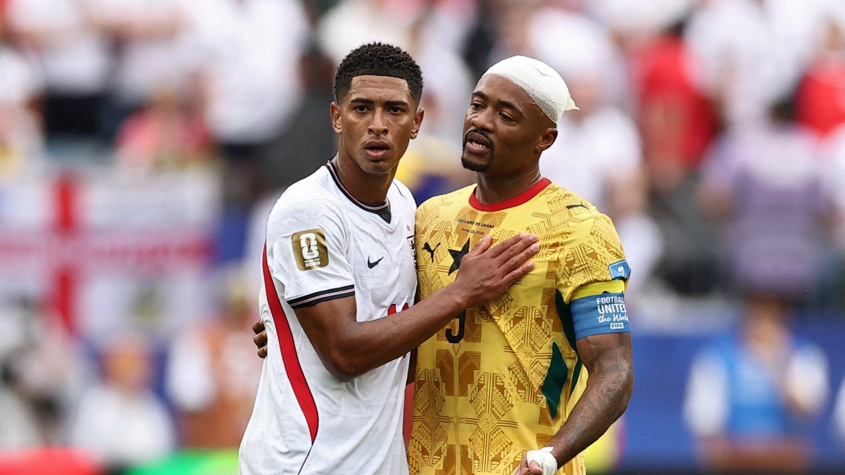 Jude Bellingham during an exchange with Ghanaian captain Jordan Ayew