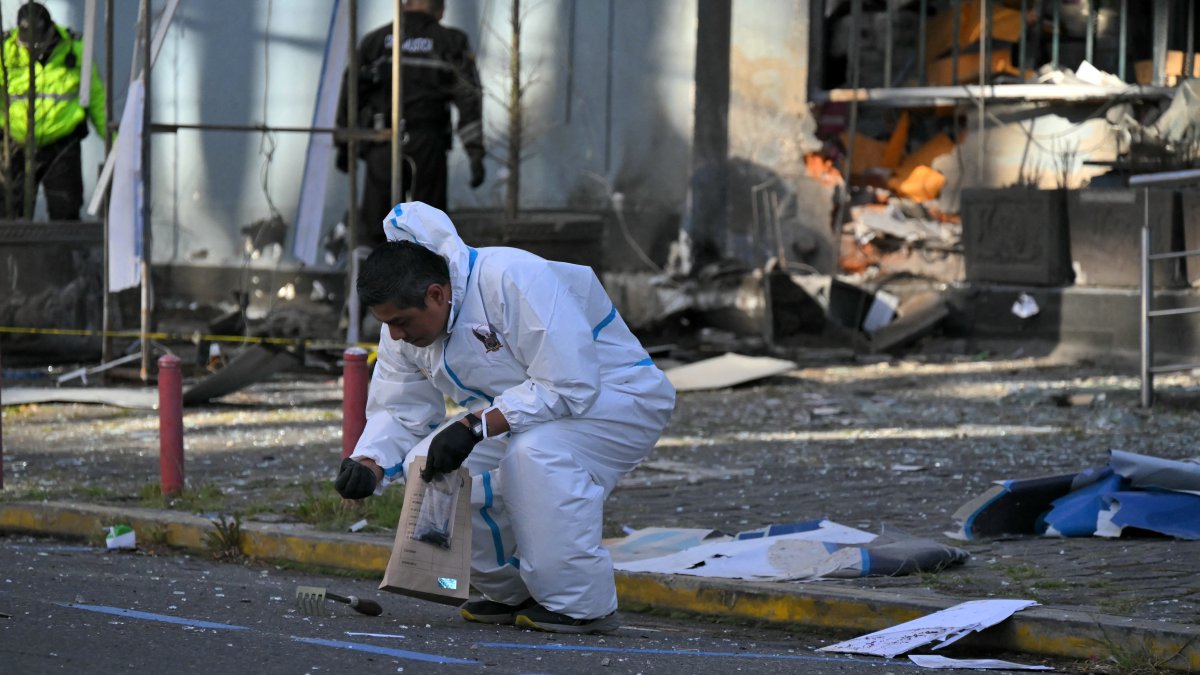 Police working outside the Ministry of Agriculture building, where a controlled bomb detonation took place