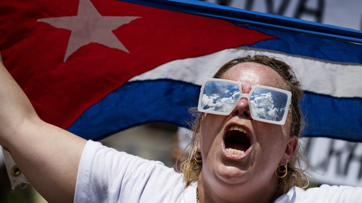 A woman calls for freedom in Cuba during a protest in 2021 (File photo)