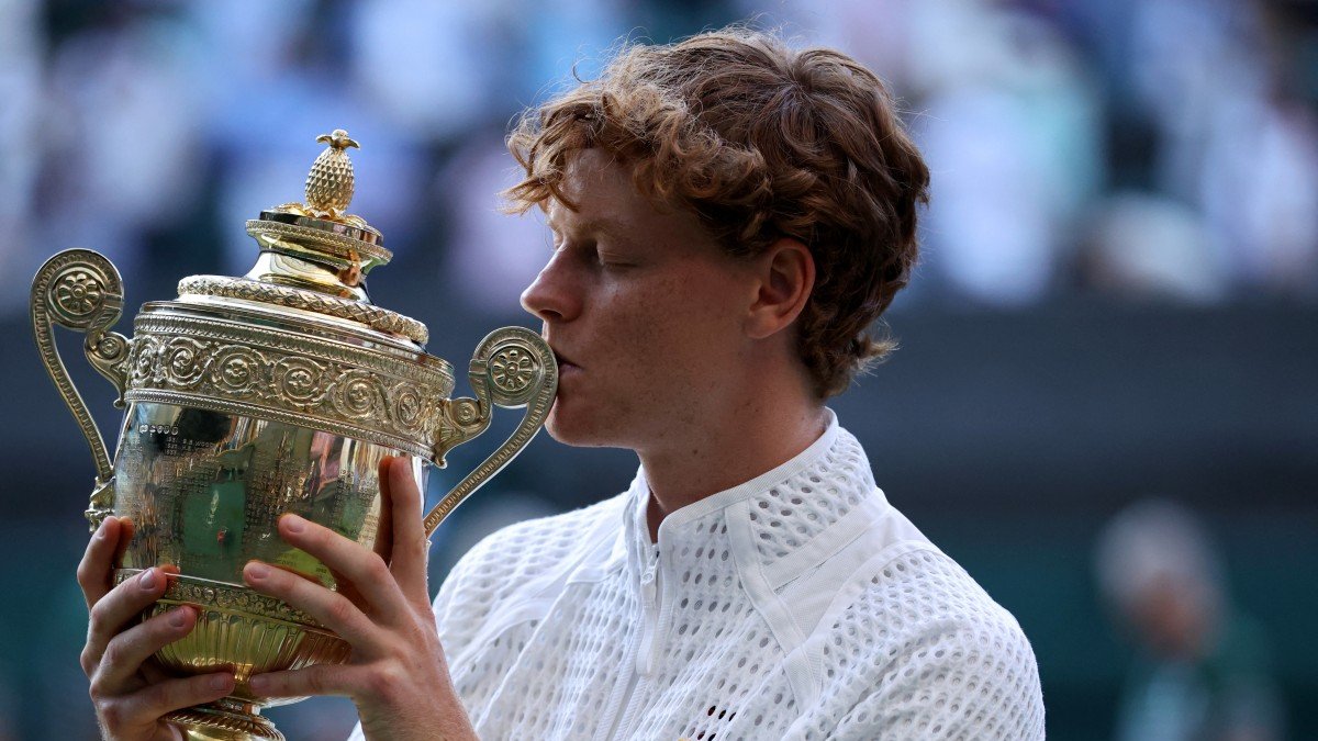 Italian Jannik Sinner poses with the trophy