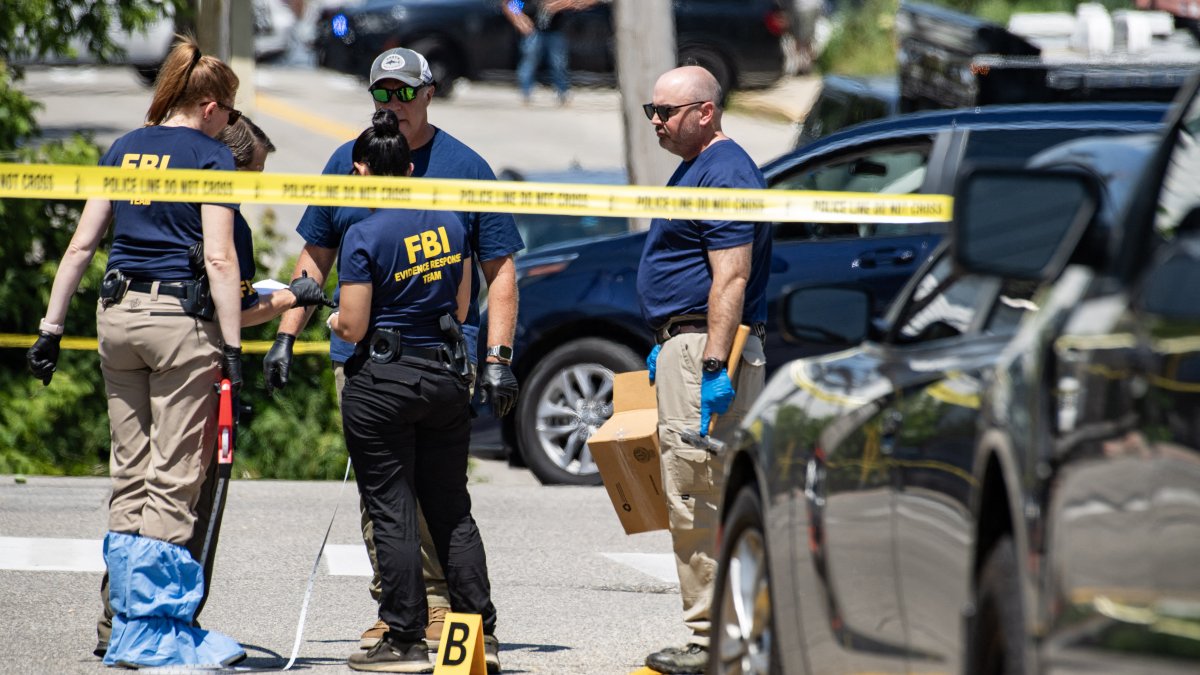 FBI investigators work the scene of an alleged ICE involved shooting in Biddeford, Maine.
