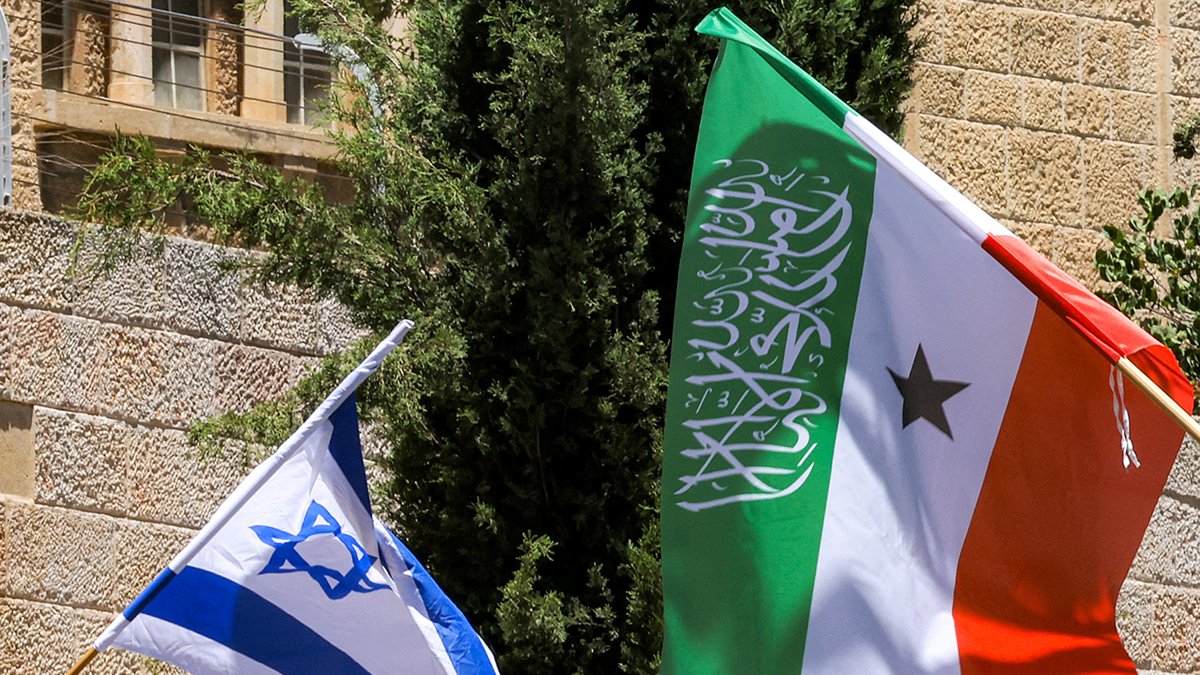 Somaliland flags fly alongside Israeli flags on a street in West Jerusalem.