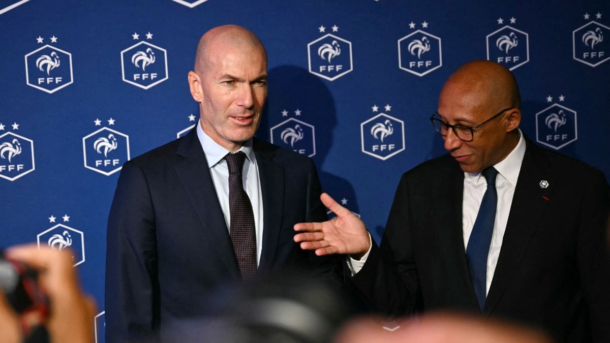 Philippe Diallo (R), president of the French Football Federation, introduces Zidane as the new French national team coach.