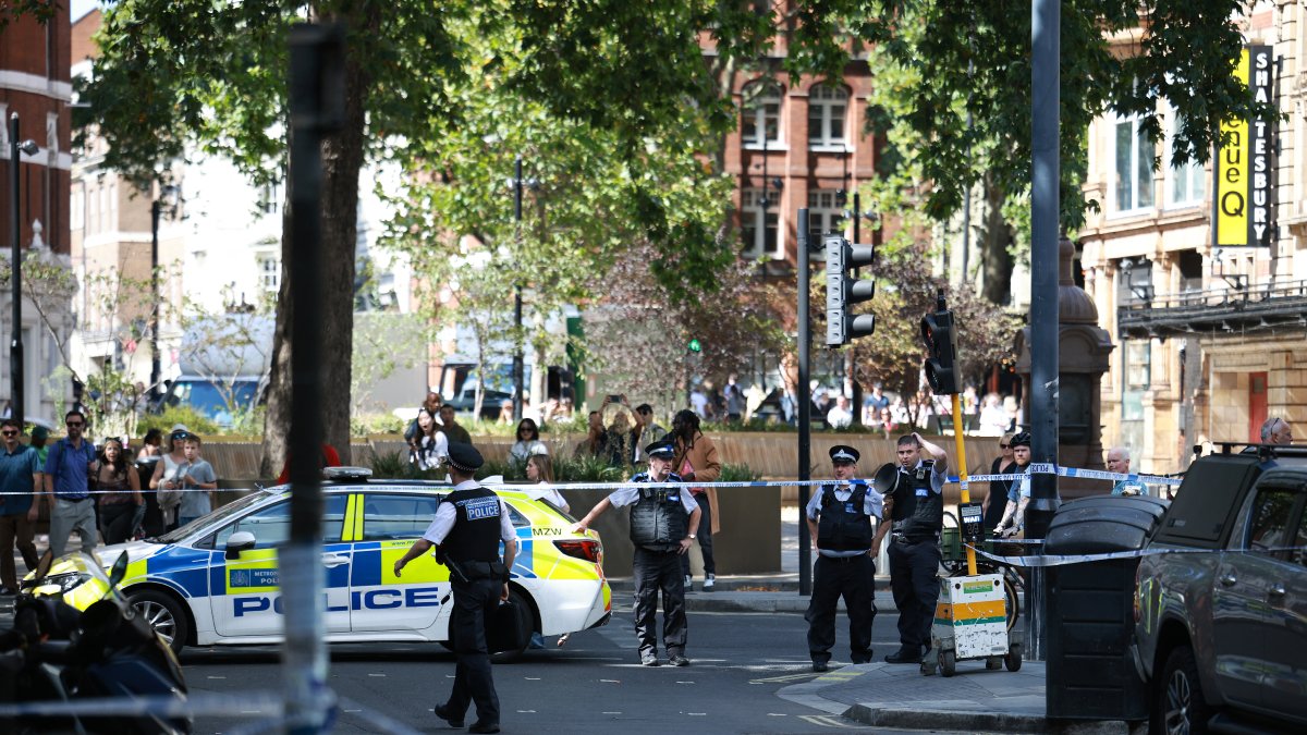 London police cordoned off the scene after arresting the attacker. Aug. 5, 2026