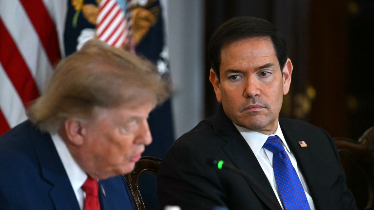El secretario Marco Rubio junto al presidente Donald Trump.