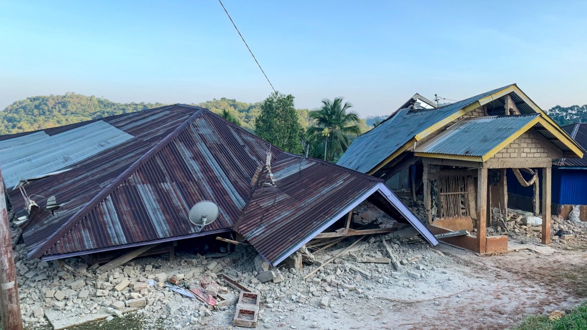 Damaged houses are seen following a 7.7-magnitude earthquake in Ruteng, Manggarai, East Nusa Tenggara, on August 15, 2026.