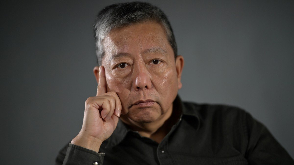 Hong Kong pro-democracy activist Lee Cheuk-yan poses during a photo shoot in 2021
