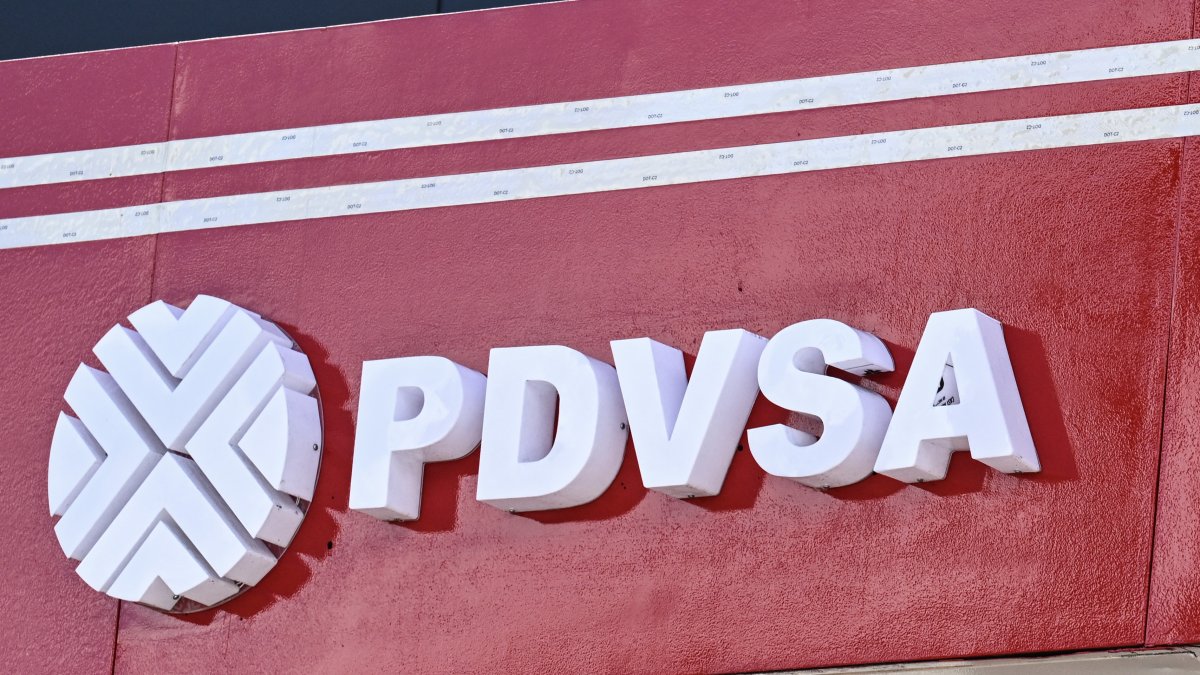 The logo of Petróleos de Venezuela Sociedad Anónima at a gas station in Venezuela.