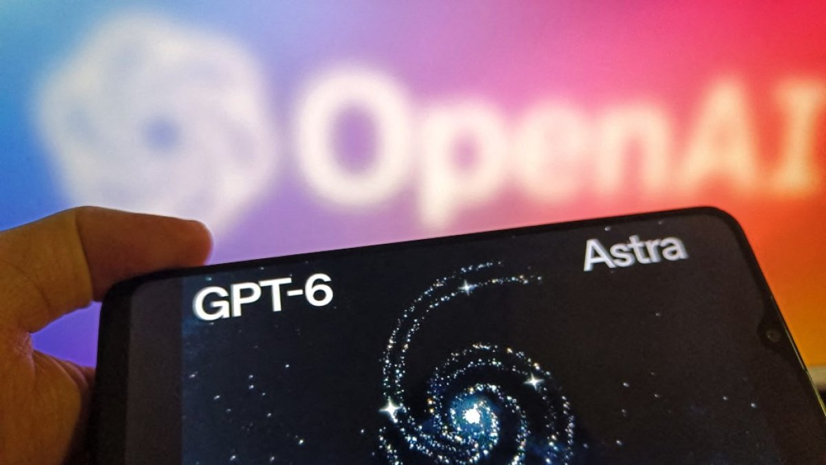 The GPT-6 Astra logo viewed on a cell phone. The OpenAI logo is visible in the background