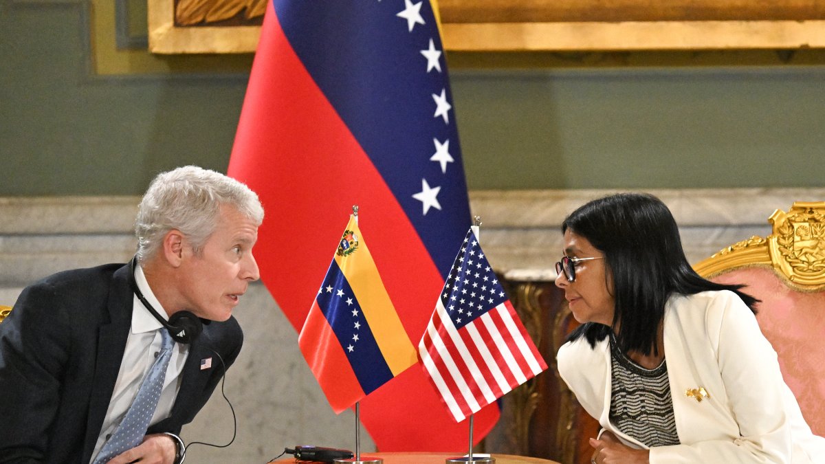 Energy Secretary Chris Wright and the president of the interim government, Delcy Rodríguez, this week at the Miraflores Palace in Caracas.