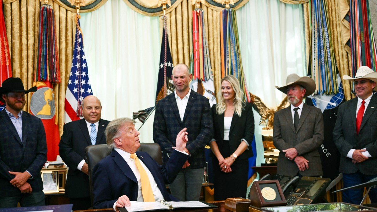 Trump before signing executive orders related to beef processing and cattle ranchers