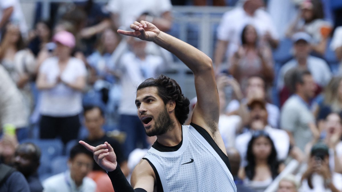 Carlos Alcaraz celebrates his victory over Tommy Paul at the US Open