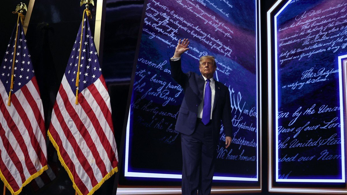 Donald Trump takes his leave after concluding his speech at the Republican convention