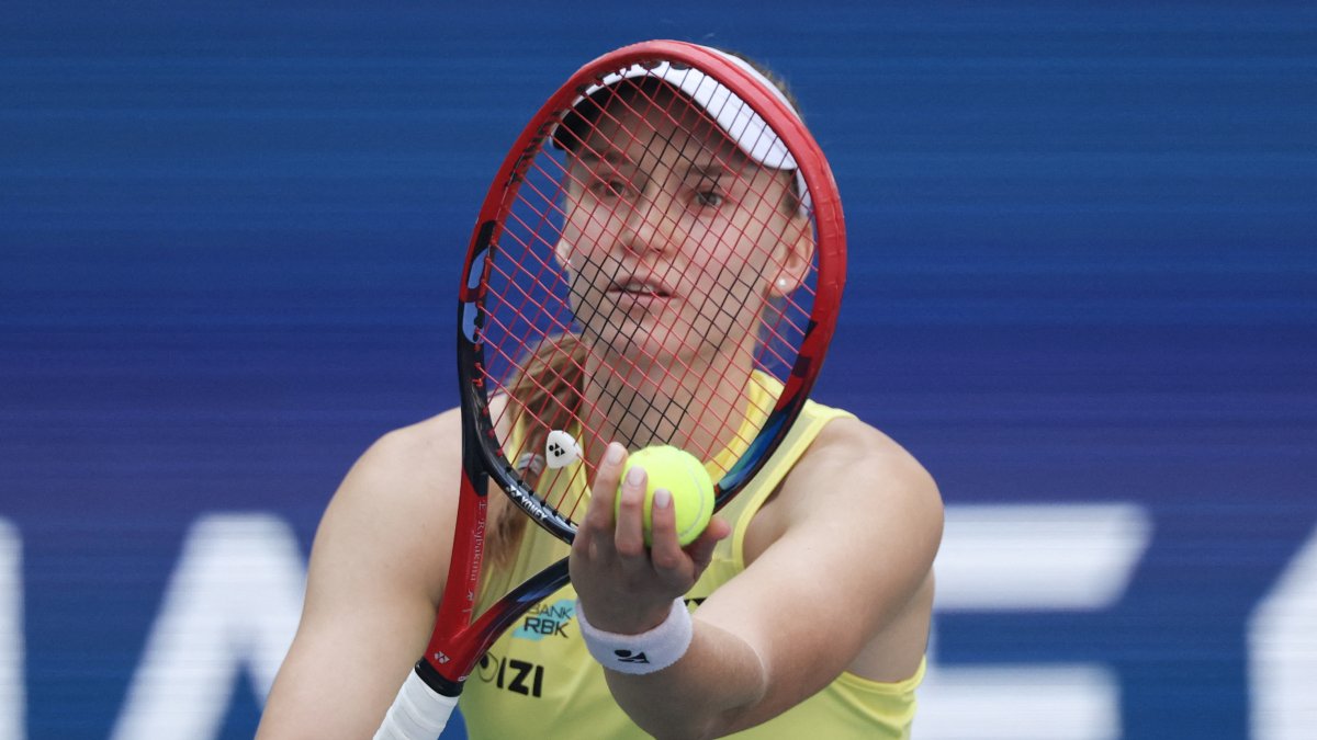 Rybakina prepares to serve in her match against Zheng Qinwen at the US Open