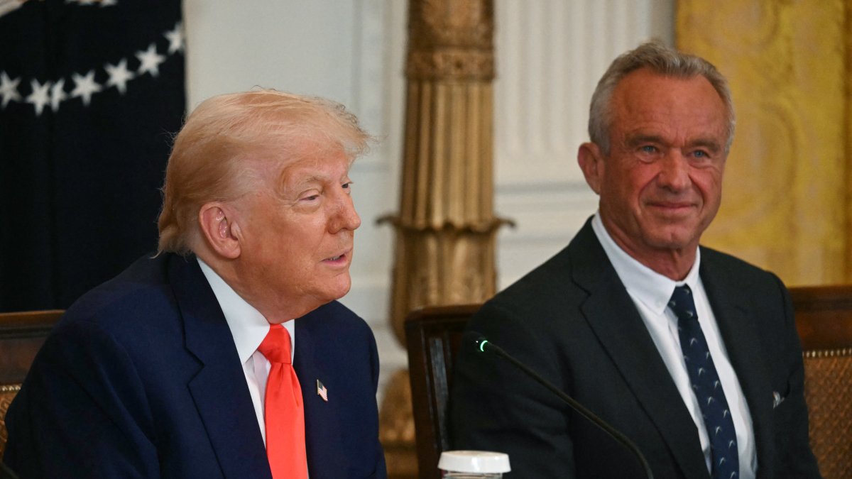 Donald Trump with Robert Kennedy Jr./ Jim Watson