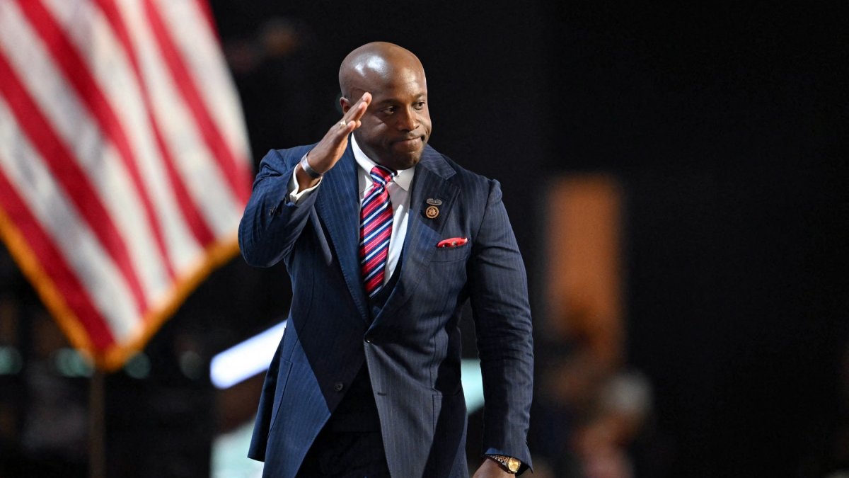 Wesley Hunt gestures after speaking on the first day of the 2024 RNC