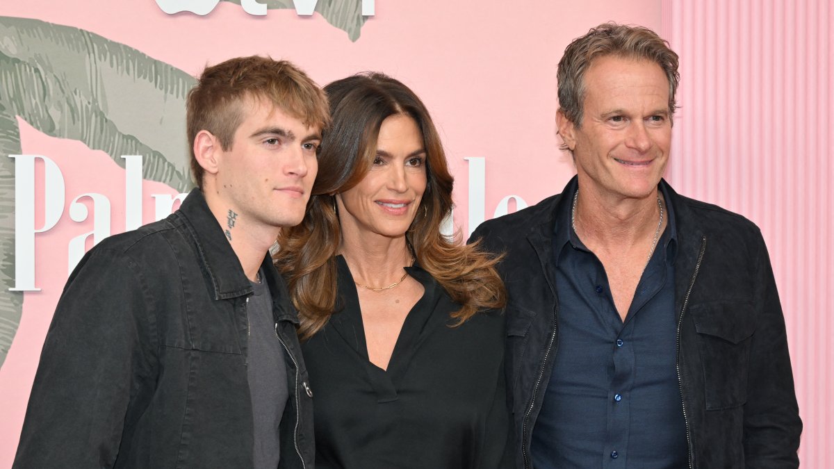 Presley Gerber (right), with his mother, Cindy Crawford, and his father, Rande Gerber