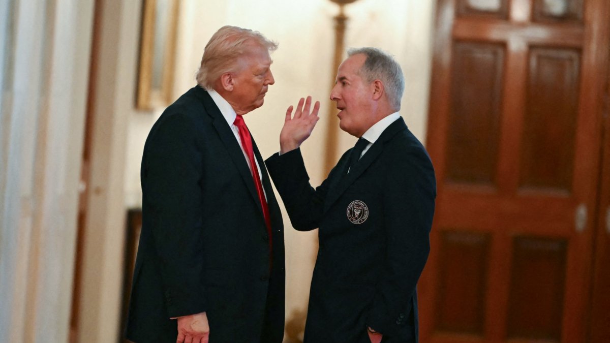 Donald Trump and Inter Miami owner and manager Jorge Mas chat after an event honoring the club