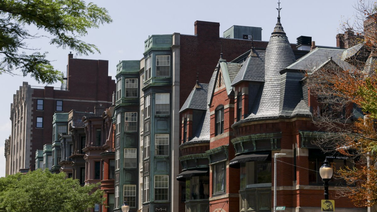 Historic brick buildings line a street in Boston's Back Bay neighborhood