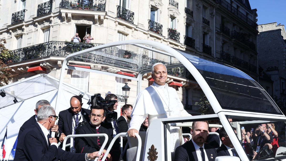 Leo XIV arrives in his Popemobile at the Notre-Dame Cathedral in Paris