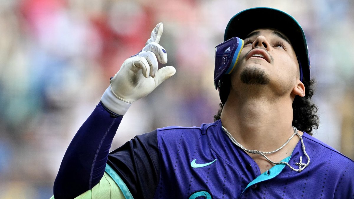 Nolan Arenado celebrates after scoring