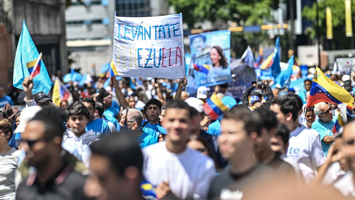 Venezuelans protesting in the streets of Caracas.