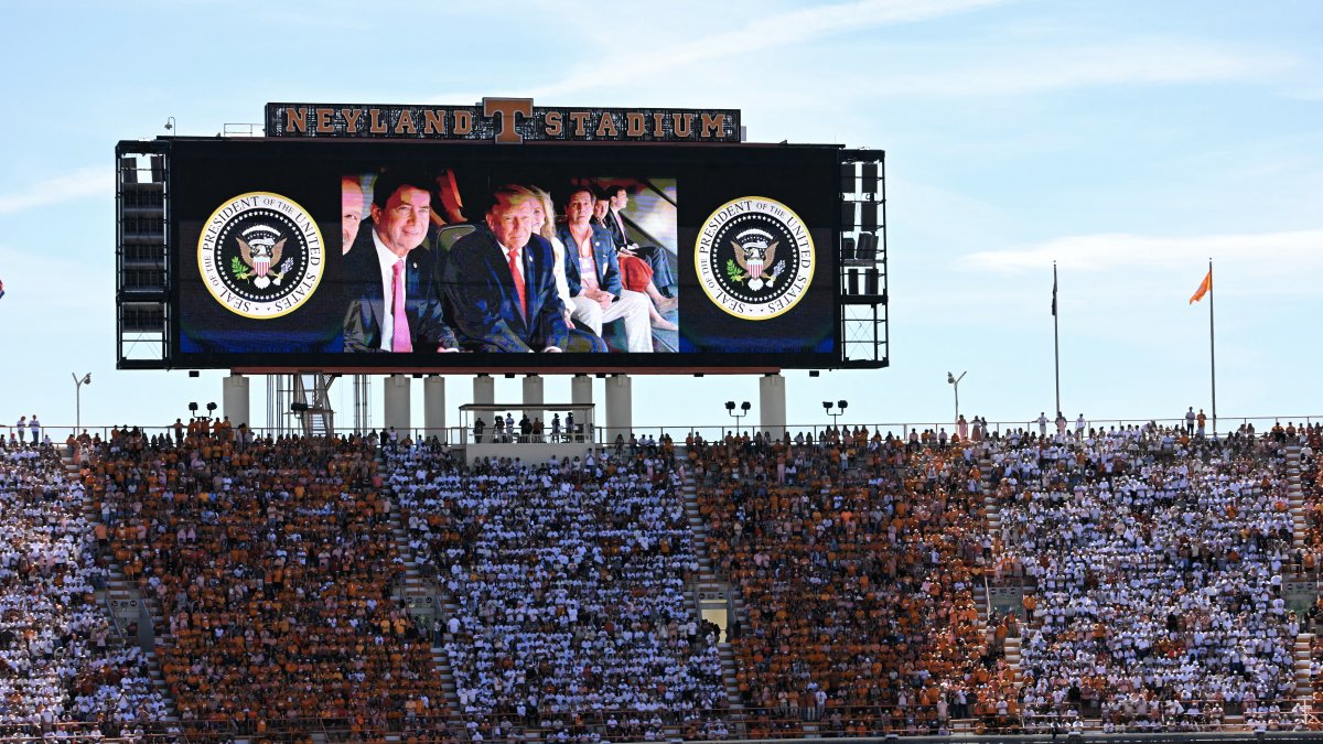 President Donald Trump enjoys a college football game in Knoxville, Tennessee, on Sept. 26, 2026.