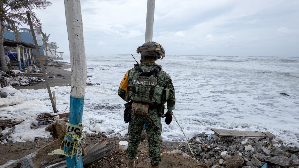 A Mexican Army soldier on the coast during the emergency caused by Hurricane Polo