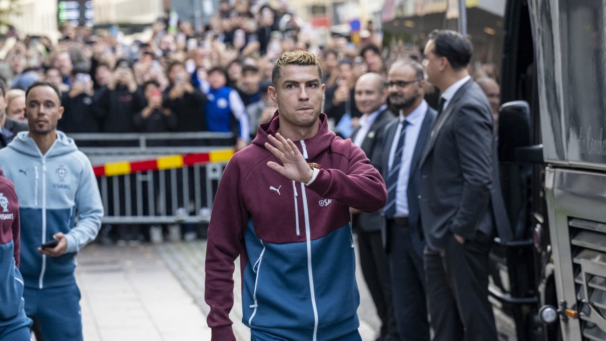 Cristiano Ronaldo and the rest of the Portugal national football team outside leave there hotel in Malmo, Sweden.