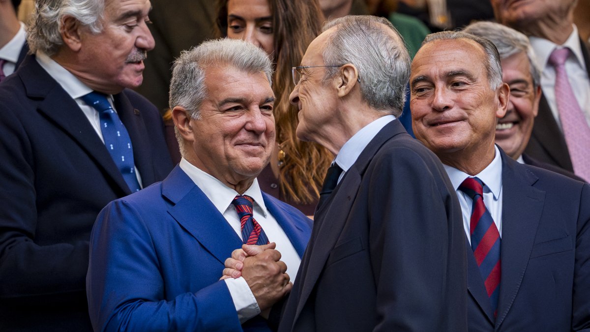 Joan Laporta and Florentino Pérez, presidents of FC Barcelona and Real Madrid, greet each other before a match in 2025