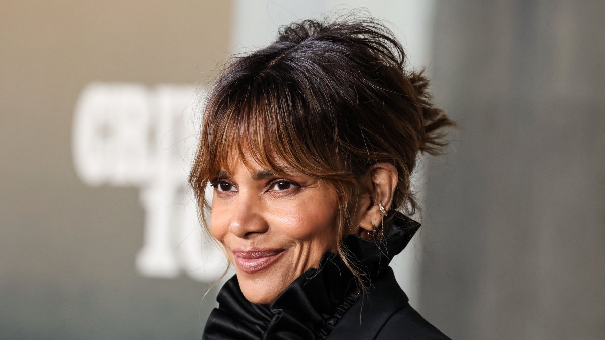 Halle Berry, wearing a Gucci and Cartier ensemble, at the world premiere of
