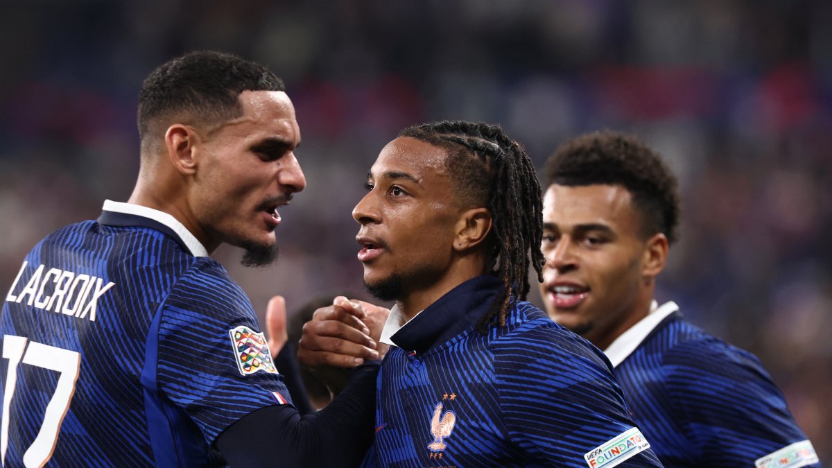 Michael Olise celebrates with his teammates one of the goals he scored for France against Belgium
