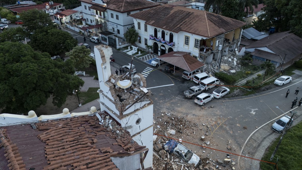 This aerial view shows the collapsed cathedral and the Penonomé provincial government building.