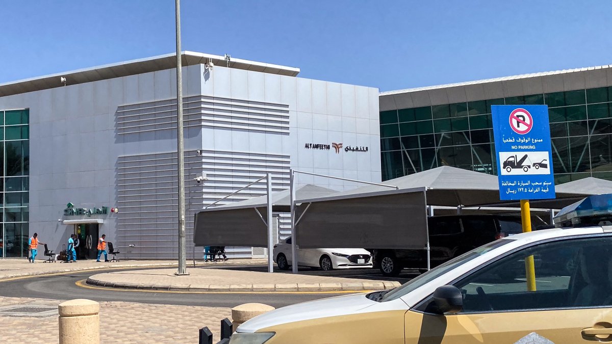 A security services vehicle is parked outside Prince Sultan bin Abdulaziz Airport.