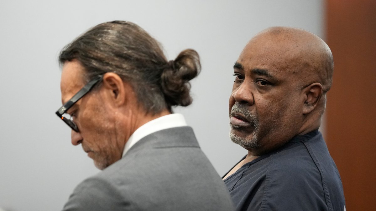 Duane Davis (right), with his attorney during the trial. October 2026