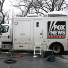 Vehicle with Fox News logo.