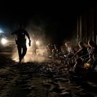 Border Patrol agents in Yuma guard a group of detained illegal immigrants.