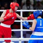 Lin Yu Ting de Taiwán (izquierda) en acción contra Sitora Turdibekova de Uzbekistán (derecha).