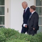 US President Joe Biden speaks with White House Physician Kevin O'Connor