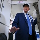 US President Donald Trump talks to the press aboard Air Force One on the way to Morristown Municipal Airport in Morristown, New Jersey, on June 6, 2025. Trump is travelling to his residence and golf club in Bedminster, New Jersey. (Photo by ANDREW CABALLERO-REYNOLDS / AFP)