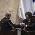 Israel's Prime Minister Benjamin Netanyahu greets Argentina's President Javier Milei in the Knesset, Israel's parliament