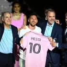 Argentine soccer star Lionel Messi (2nd L) is presented by (from R) owners of Inter Miami CF David Beckham, Jose R. Mas and Jorge Mas as the newest player for Major League Soccer's Inter Miami CF, at DRV PNK Stadium in Fort Lauderdale, Florida, on July 16, 2023. (Photo by CHANDAN KHANNA / AFP)
