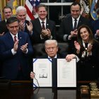 Trump displays signed bill to reopen government