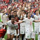 Moroccan players celebrate after their victory over Canada/ Ronaldo Schemidt
