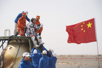 Astronaut Ye Guangfu exits the return capsule of the Shenzhou-13 spacecraft at the Dongfeng landing site in north China's Inner Mongolia autonomous region, April 16, 2022. Three Chinese astronauts, the second team sent into orbit to build the space station, have completed their six-month mission and returned safely to Earth on Saturday. / press action
