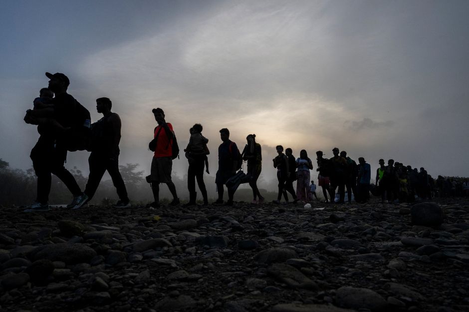 Immigrants cross the Selva del Darién